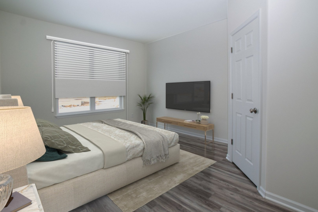 Trails of Dawson Creek owner's bedroom with white walls, luxury vinyl plank and large window